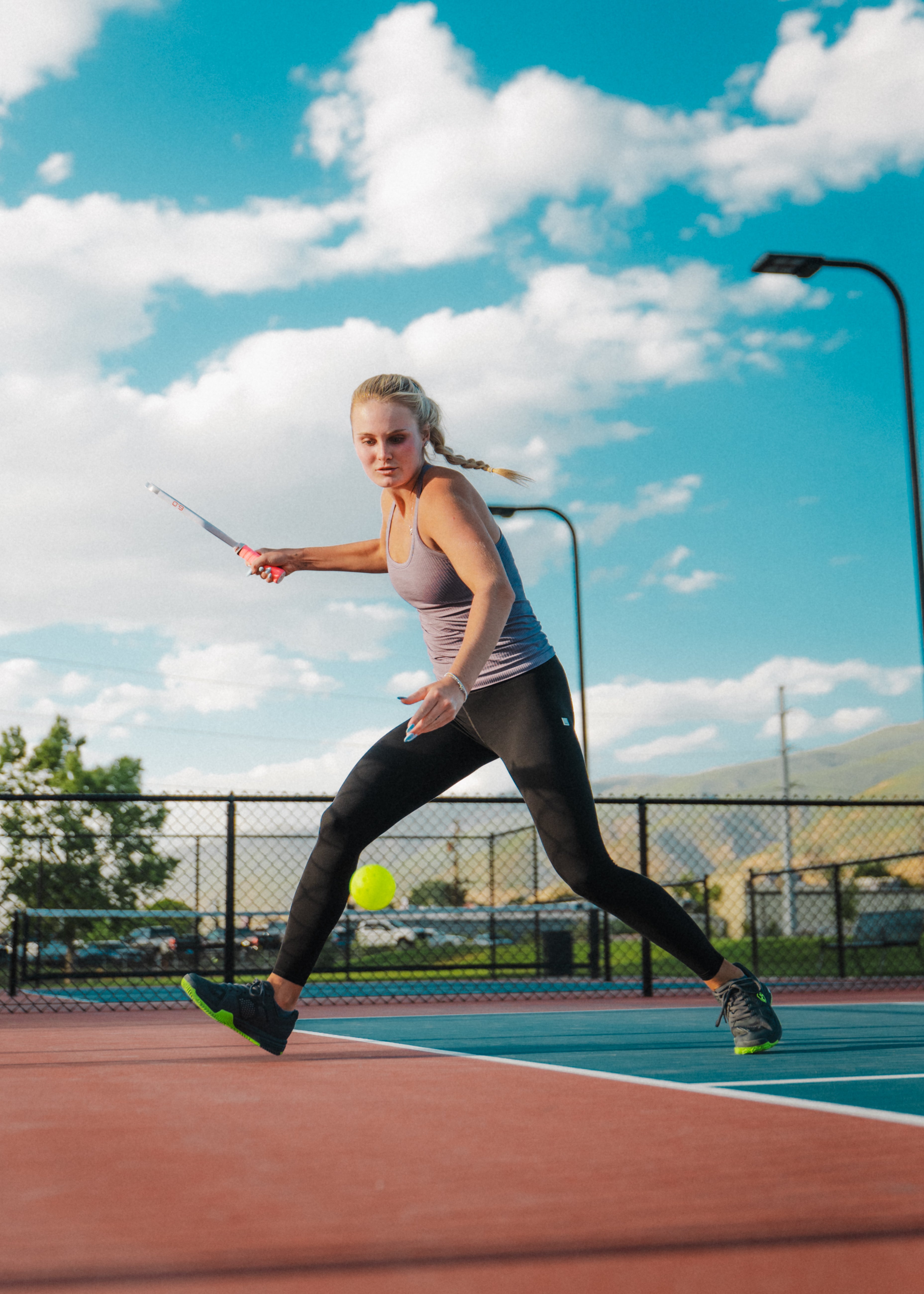 Professional pickleball player Layne Sleet wearing women's pickleball shoes. Montis pickleball shoes in black.